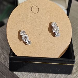 14k white gold CZ earrings. Stamped 14k CZ. Can be worn two ways as shown in pic